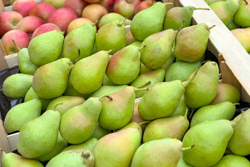 Pile of pears in a wooden boxes (Close up)