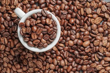 roasted coffee beans as background close up