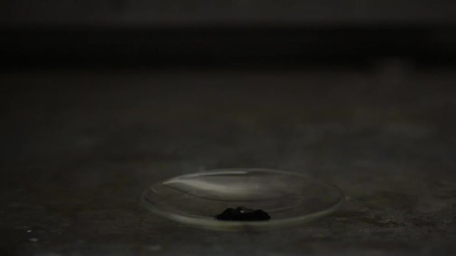Spontaneous combustion reaction between potassium permanganate and glycerol 