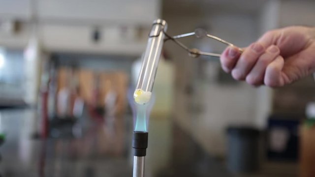 Combustion reaction using sucrose to produce caramel and steam.