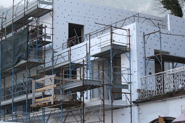 House under construction with scaffolding