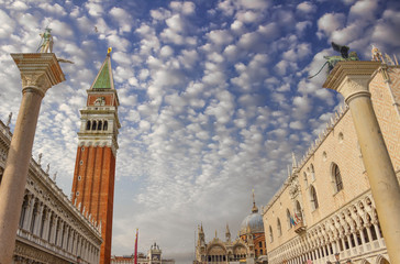 Fototapeta na wymiar Piazza San Marco of Venice: National Library Marciana, Columns of San Marco and San Teodoro, Campanile, Doge's Palace.