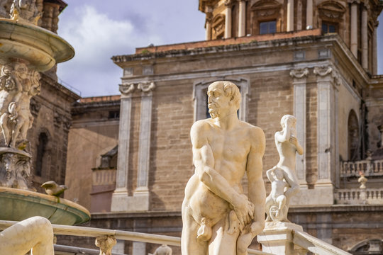 Statue of man in Praetorian Fountain in centre of Piazza Pretoria with detail of ancient Greek Mythology. Palermo, Sicily