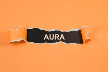 AURA, health and medical concept on torn paper - Image 