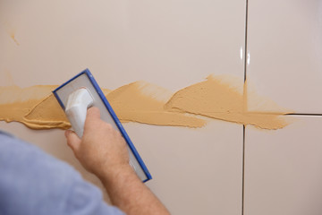 After laying the tiles on the wall, you must fill the spaces between the tiles, a special cement...