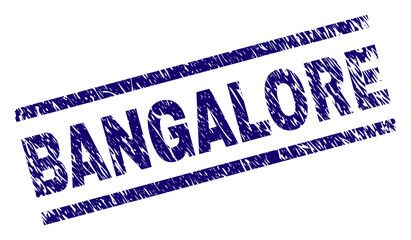 BANGALORE seal print with grunge style. Blue vector rubber print of BANGALORE text with dirty texture. Text tag is placed between parallel lines.