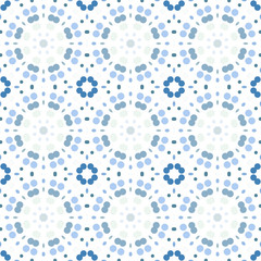 Seamless abstract pattern background with a variety of colored circles.