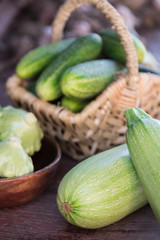Vegetable harvest: fresh cucumbers, squash and zucchini