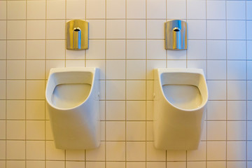 Two urinals in a public toilet in Germany