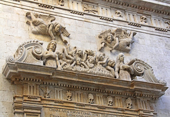anime penitenti nel Purgatorio; portale della chiesa del Purgatorio, Bitonto