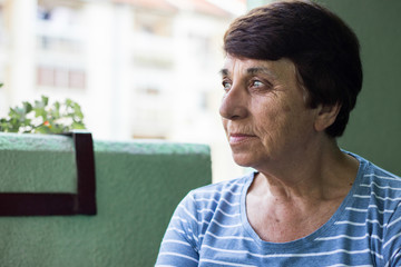 Obraz premium Portrait of a pensive senior woman
