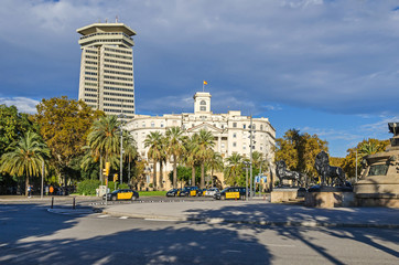 Fototapeta na wymiar Building of the Military Base and an office skyscraper Edifici Colon