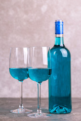 Two glasses and bottle of trendy blue wine. Spanish chardonnay