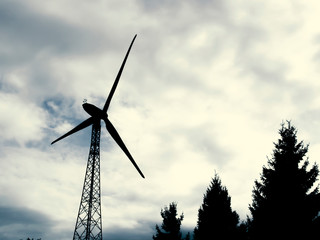 electricity generating wind turbine, landscape of the sky and trees