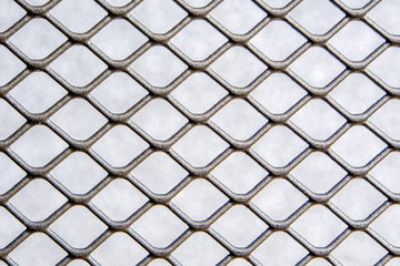 silver grey color metal wire mesh fence with grey background