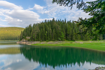 Fototapeta na wymiar The magnificent Black Lake is located in the National Park Durmitor in the north of Montenegro.