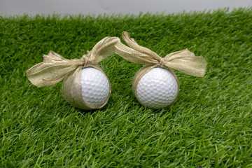 Golf Easter Holiday with golf ball on green grass
