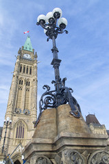 Fototapeta na wymiar Street light in front of the Ottawa Parliament Clock Tower