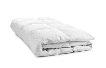 Folded soft blanket on white background. Textile for bedroom interior