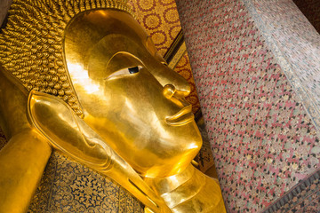 Reclining golden buddha in Bangkok temple