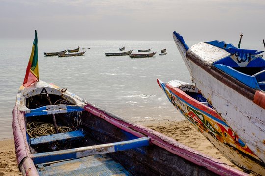 Traditional fishing boats on the coast of Saly, Thies region, Senegal, Africa