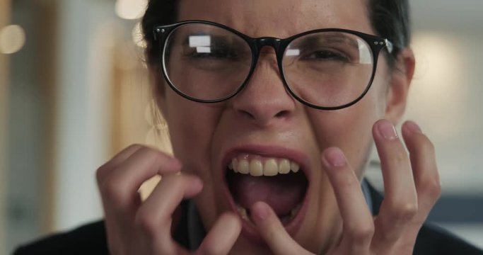 Slow Motion Hysterical Angry Business Woman Screaming Madly at Camera