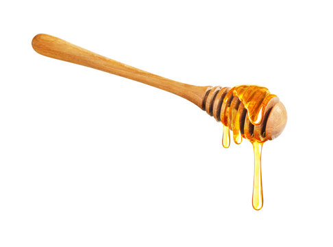 Honey dripping isolated on a white background, Dripped honey, Honey dipper