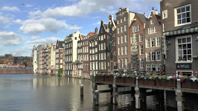 Amsterdam, Netherlands. Houses on the channel Damrak.