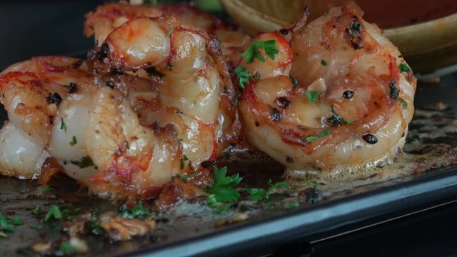 Eating Sizzling Grilled Garlic Prawns with Spicy Dipping Sauce