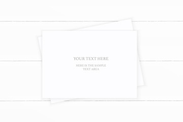 Flat lay top view elegant white composition paper on wooden background. Xmas decoration design