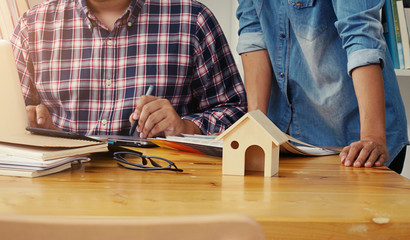 Colleagues interior designer Corporate Achievement Planning Design on blueprint Teamwork Concept with compasses.