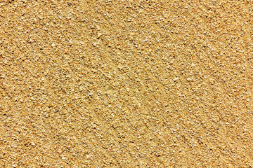 large Golden sand of the sea, the surface of the sea coast, texture, background