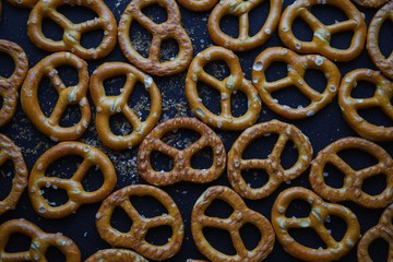 Salted pretzel on table