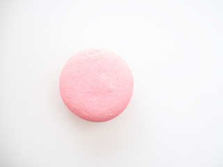 Pink macaroon on white background