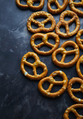 Salted pretzel on table