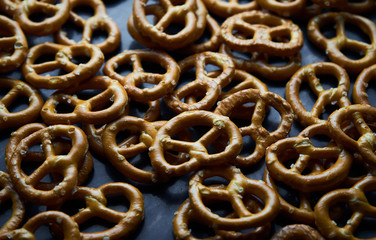 Salted pretzel on table