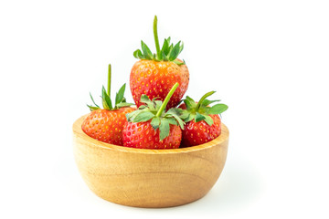 fresh red strawberry in bowl wooden. isolated on white background and clipping path.