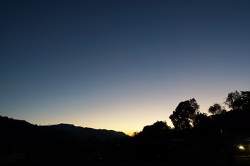Dramatic backdrop of sky and clouds with the sun shining, sky background, cloudscape concept. Space for text in template, Empty, Looking up