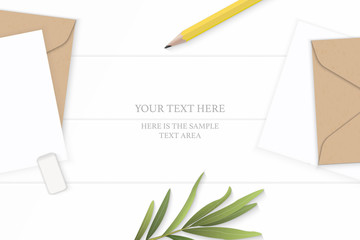 Flat lay top view elegant white composition letter kraft paper envelope tarragon leaf yellow pencil eraser on wooden background