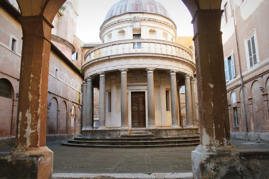 Exterior view of famous reinassance bramante masterpiece tempietto located at San Pietro in Montorio courtyard, Rome, Italy