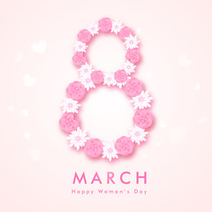 Text 8 made by paper cut flowers on glossy pink background. Can be used as greeting card design. © Abdul Qaiyoom