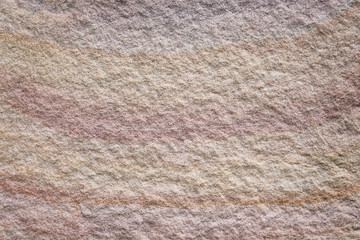 Texture brown sandstone in colorful patterns on background