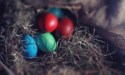 Easter painted eggs on burlap