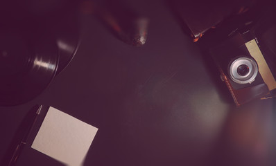 Vinyl plate and retro camera