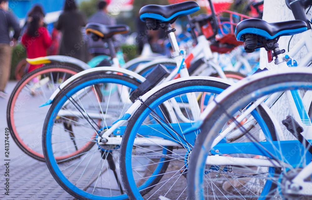 Wall mural shared bicycle concept: sharing bicycles into urban garbage