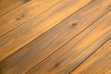 Wooden table background. Warm light.
