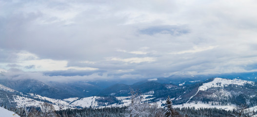 Fototapeta na wymiar Beautiful winter panorama at Carpathian mountains
