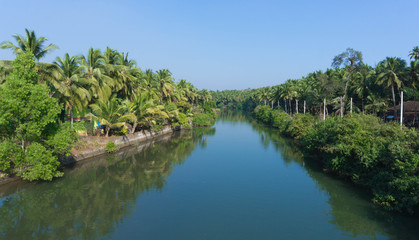 Fototapeta na wymiar Scene on the Sal River in Southern Goa near to the coastal resort area of Cavelossim, India
