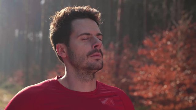 Man taking a deep breath