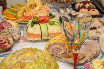 New Year's table made by delicious food.